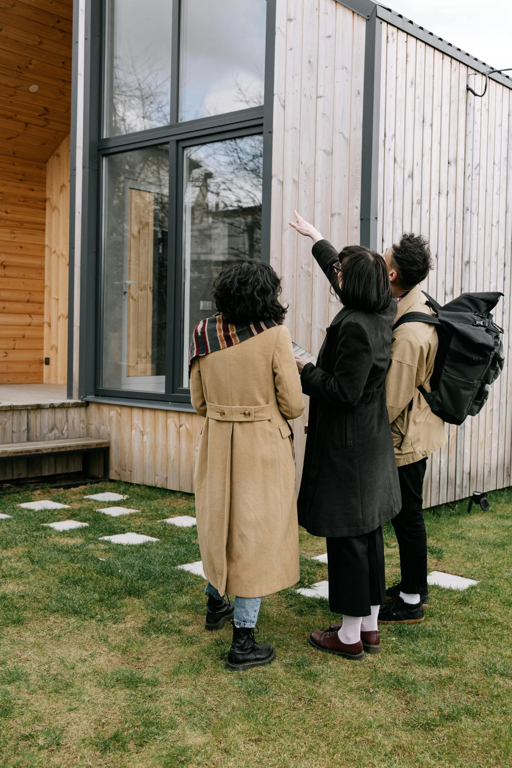 Woman Showing House to a Couple